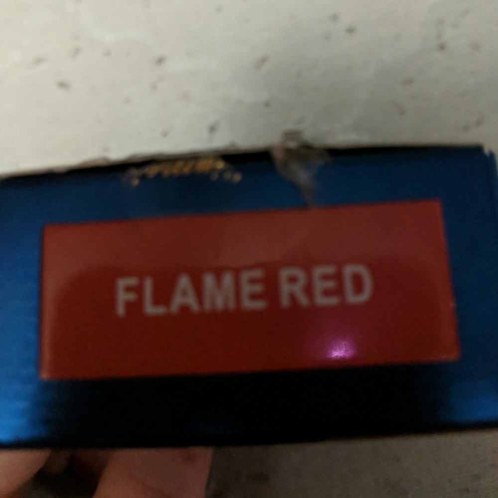 Kailijumei lip stick with gold flakes and a flower